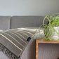 Equinoccio Throw Blanket - Cedar Brown
